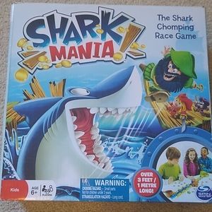 Shark Mania! The Shark Chomping Race Game. Spin Master. 2-4 Players. Ages 6+.